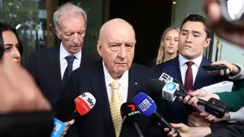Sexual Assault Accusations Against Top Down Under Broadcaster Lessened